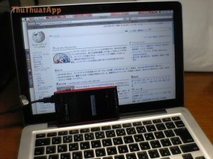 Mobile phone tethered to a laptop